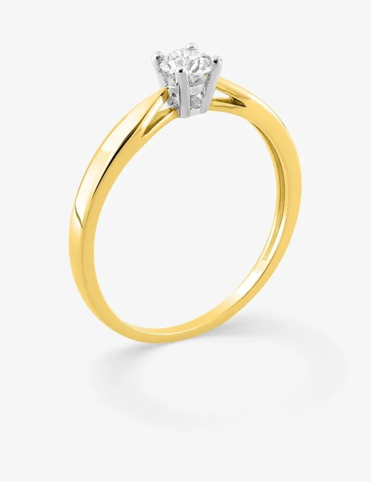 Bague bicolore or jaune 750 ‰ et oxyde de zirconium 0,30 ct SO OR