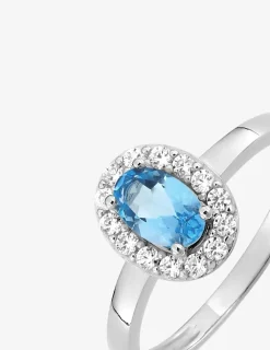 Bague en or blanc 375 ‰ avec topaze bleue et oxydes de ziconium SO OR