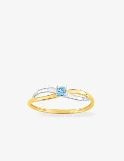 Bague en or jaune 750 ‰ avec topaze bleue et rhodium SO OR