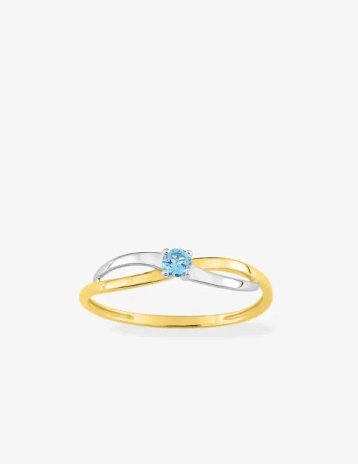Bague en or jaune 750 ‰ avec topaze bleue et rhodium SO OR