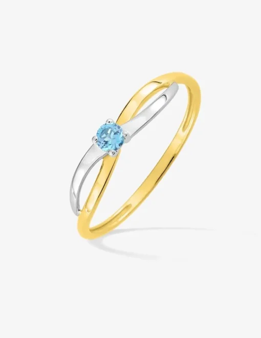 Bague en or jaune 750 ‰ avec topaze bleue et rhodium SO OR