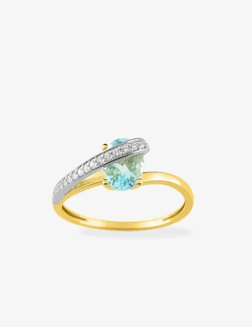 Bague en or jaune 750 ‰ avec aigue-marine, oxyde de zirconium et rhodium SO OR
