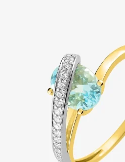 Bague en or jaune 750 ‰ avec aigue-marine, oxyde de zirconium et rhodium SO OR