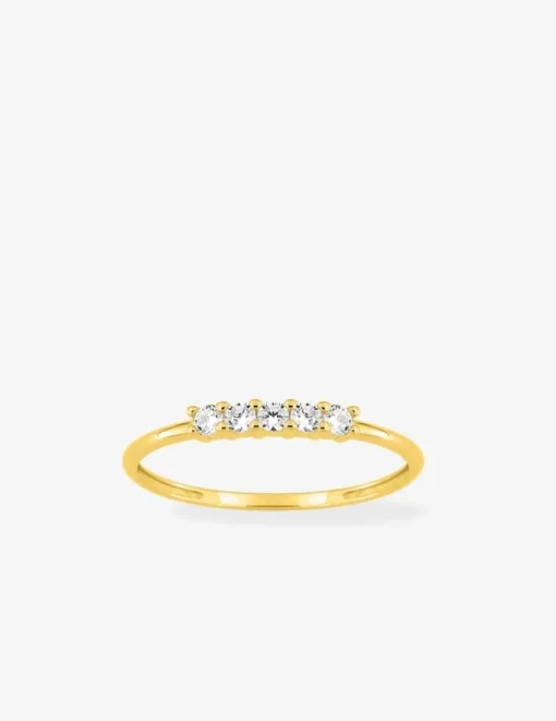 Bague en or jaune 375 ‰ et cinq oxydes de zirconium blancs SO OR
