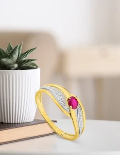 Bague entrelacs en or jaune 375‰ et rubis SO OR