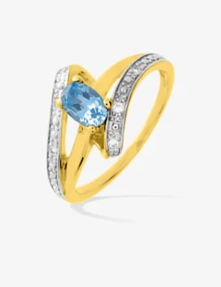 Bague fantaisie plaqué or, rhodium et oxyde de zirconium bleu clair SO OR