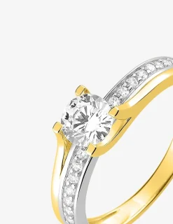 Bague fantaisie solitaire accompagné or jaune 750 ‰, rhodium et pavage oxyde de zirconium SO OR