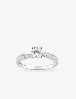 Bague fantaisie solitaire accompagné or blanc 750 ‰ entouré d'un pavage d'oxydes de zirconium SO OR