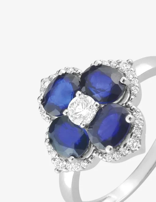 Bague fleur or blanc 375‰, saphir et oxydes de zirconium SO OR