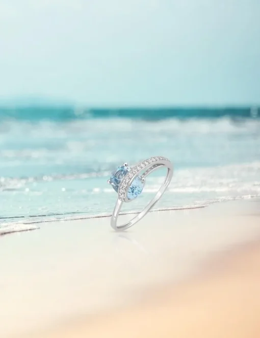 Bague mono fil or blanc 375‰, topaze, oxyde de zirconium SO OR