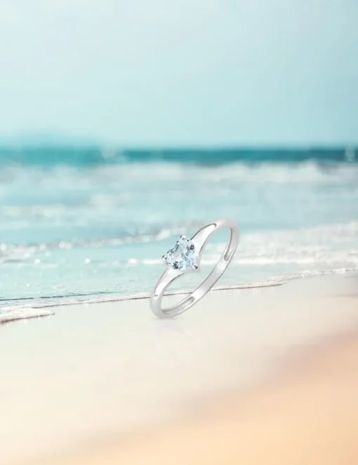 Bague or blanc 375‰ et topaze SO OR