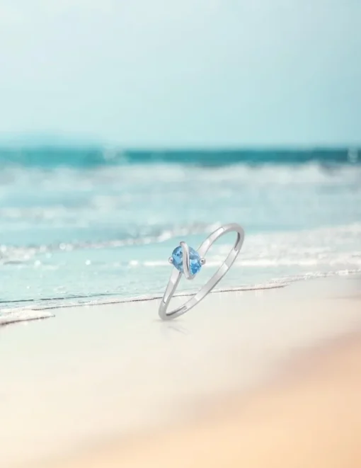 Bague or blanc 375‰, topaze SO OR