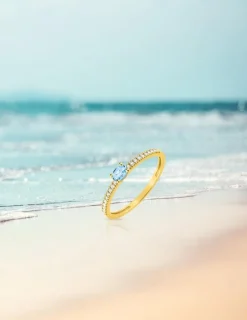 Bague or jaune 375‰, topaze, oxyde de zirconium SO OR