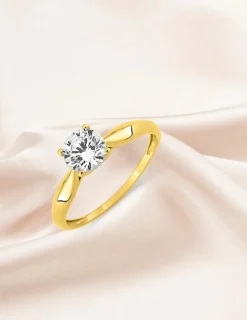 Bague solitaire 4 griffes or jaune 375 ‰ et oxyde de zirconium SO OR