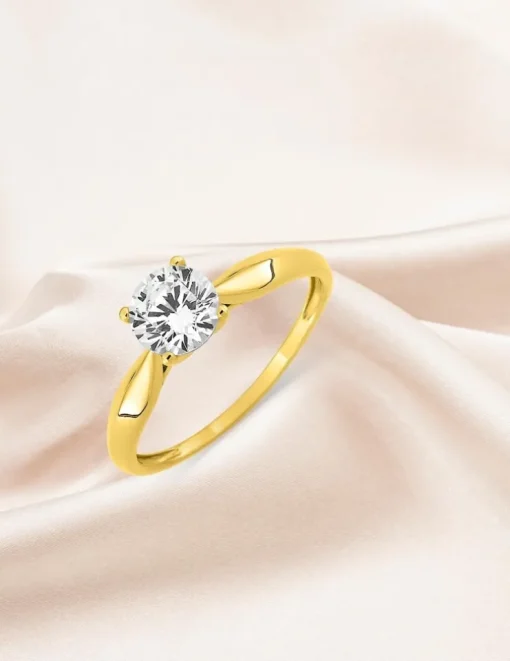 Bague solitaire 4 griffes or jaune 375 ‰ et oxyde de zirconium SO OR