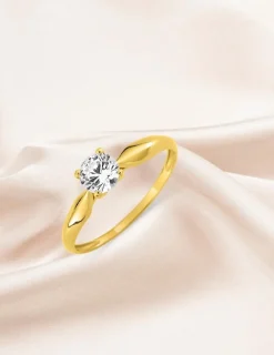 Bague solitaire 4 griffes or jaune 375 ‰ et oxyde de zirconium SO OR