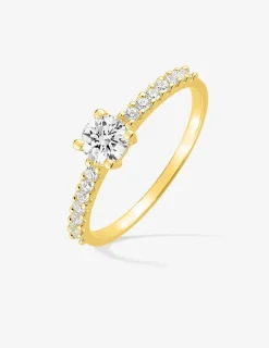 Bague solitaire accompagné or 375 ‰ et oxydes de zirconium SO OR