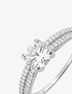 Bague solitaire accompagné or blanc 375 ‰ et oxydes de zirconium SO OR