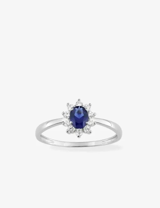 Bague solitaire accompagnée fleur argent rhodié 925 ‰ et oxyde de zirconium bleu foncé SO OR