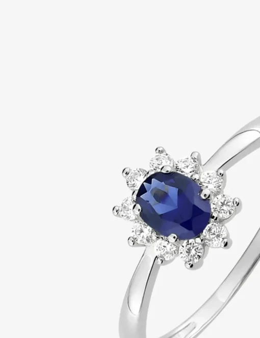 Bague solitaire accompagnée fleur argent rhodié 925 ‰ et oxyde de zirconium bleu foncé SO OR