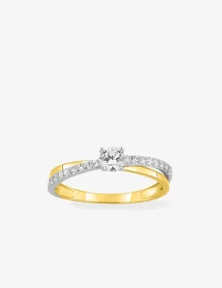 Bague solitaire accompagné bicolore or 375 ‰, oxydes de zirconium, rhodium SO OR