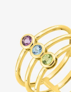 Bague trilogie en or jaune 375 ‰, améthyste, péridot et topaze bleue SO OR