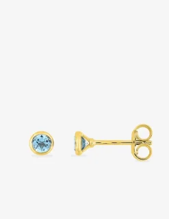 Boucles d'oreilles clous en or jaune 375 ‰ et topaze bleue SO OR