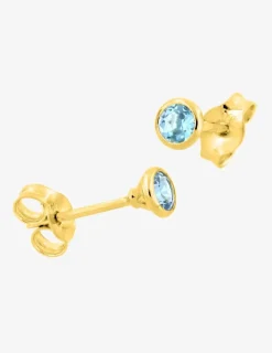 Boucles d'oreilles clous en or jaune 375 ‰ et topaze bleue SO OR