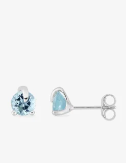 Boucles d'oreilles clous or blanc 375 ‰, topaze bleue traitée SO OR