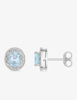 Boucles d'oreilles clous or blanc 375 ‰, topaze bleue traitée et oxyde de zirconium SO OR