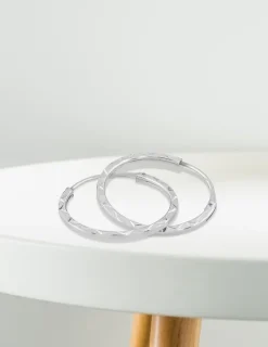 Boucles d'oreilles créoles diamantées en or blanc 375 ‰ SO OR