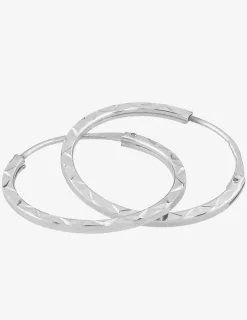 Boucles d'oreilles créoles diamantées en or blanc 375 ‰ SO OR