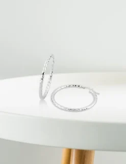 Boucles d'oreilles créoles diamantées en or blanc 375 ‰ SO OR