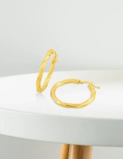 Boucles d'oreilles créoles torsadées en or jaune 375 ‰ SO OR