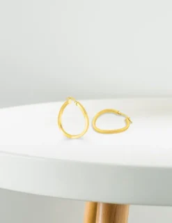 Boucles d'oreilles créoles ondulée en or jaune 375 ‰ SO OR