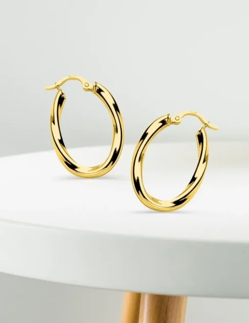 Boucles d'oreilles créoles torsadées or jaune 750 ‰ SO OR