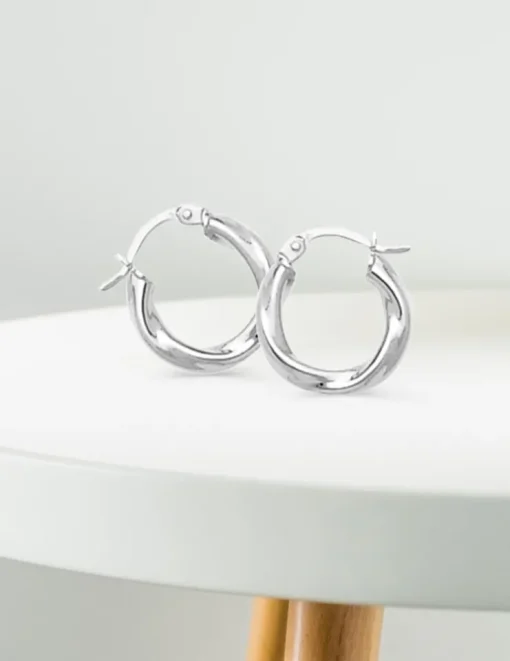 Boucles d'oreilles créoles or blanc torsadées 750 ‰ diamètre 10 mm SO OR