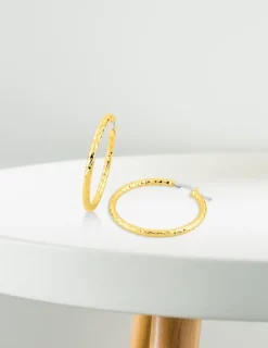 Boucles d'oreilles créoles diamantées en or jaune 750 ‰ SO OR