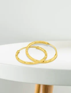Boucles d'oreilles créoles diamantées en or jaune 375 ‰ SO OR