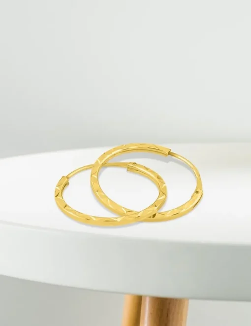Boucles d'oreilles créoles diamantées en or jaune 375 ‰ SO OR