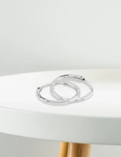 Boucles d'oreilles créoles diamantées en or blanc 375 ‰ SO OR