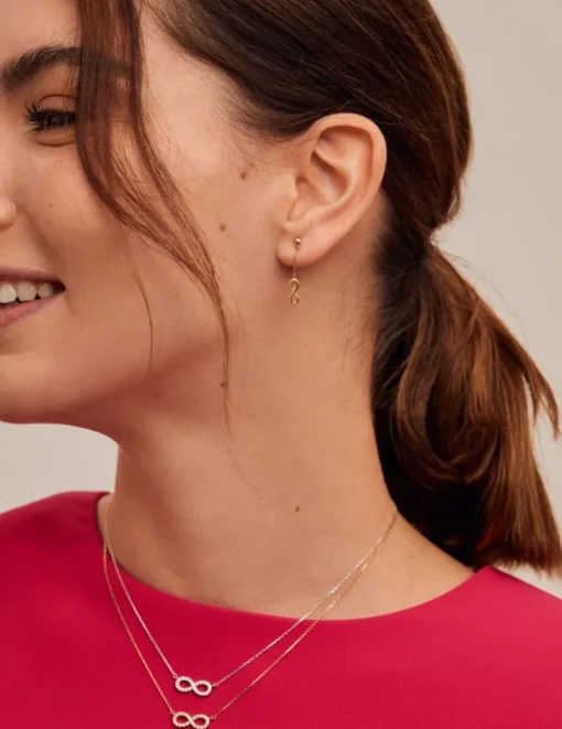 Boucles d'oreilles pendantes or jaune 375‰ motif "infini" SO OR