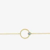 Bracelet cercle en or jaune 375‰ et topaze bleue SO OR