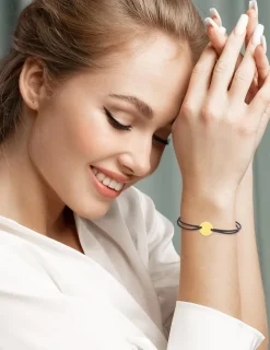 Bracelet cordon noir motif or jaune 375 ‰ SO OR