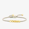 Bracelet cordon perles acier doré fantaisie SO OR