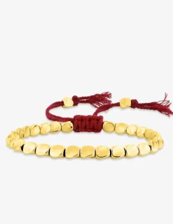 Bracelet cordon rouge avec des détails en cuivre doré SO OR