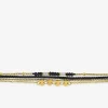Bracelet en acier doré, cristaux synthétiques et nylon SO OR