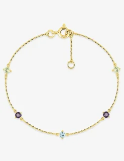 Bracelet en or jaune 750‰ topaze et autres pierres fantaisie SO OR