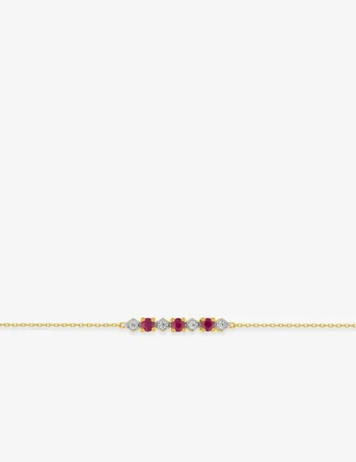 Bracelet en or jaune et blanc 375 ‰, rubis et oxydes de zirconium SO OR