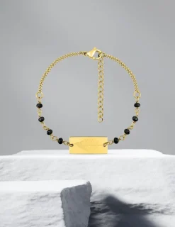 Bracelet fantaisie cristal noir, petite chaîne et plaque en acier doré SO OR
